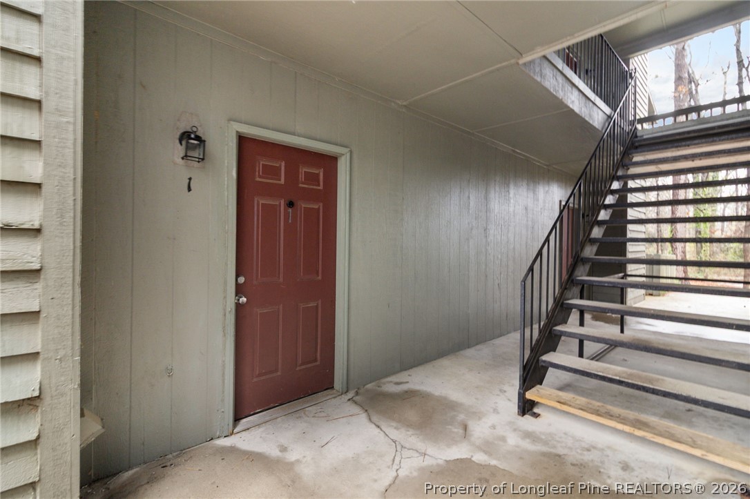 1908 Tryon Drive, Unit 1 Fayetteville, NC 28303 - Photo 4 of 29 a view of an entryway with staircase