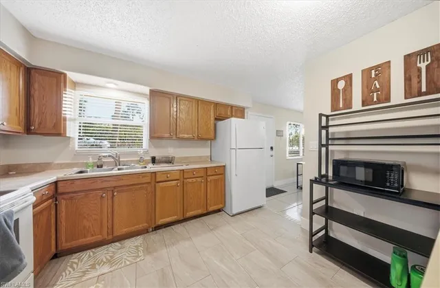 $195,000 | 3325 Airport Road, Unit U4, Naples, FL 34105