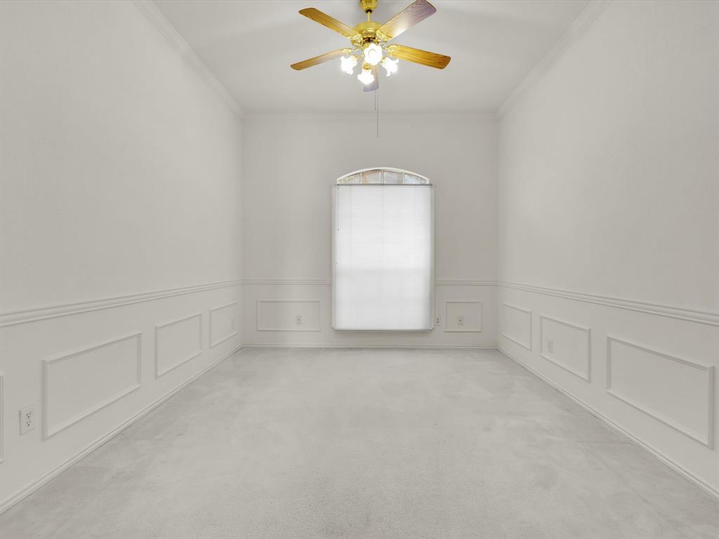 10832 Sky Ridge Court Haslet, TX 76052 - Photo 21 of 40 a view of a livingroom with a ceiling fan and window