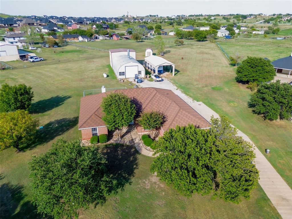10832 Sky Ridge Court Haslet, TX 76052 - Photo 6 of 40 an aerial view of a house with outdoor space and lake view