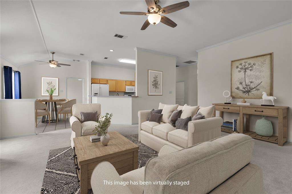 10832 Sky Ridge Court Haslet, TX 76052 - Photo 8 of 40 a living room with furniture and a wooden floor