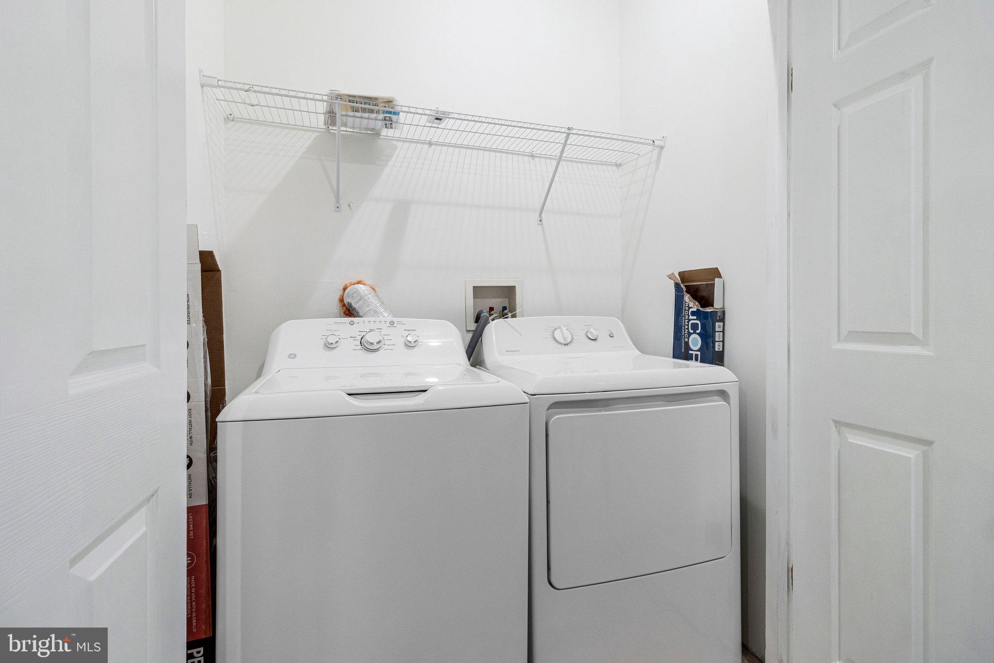 11515 Goodloe Road Silver Spring, MD 20906 - Photo 15 of 33 a utility room with dryer and washer