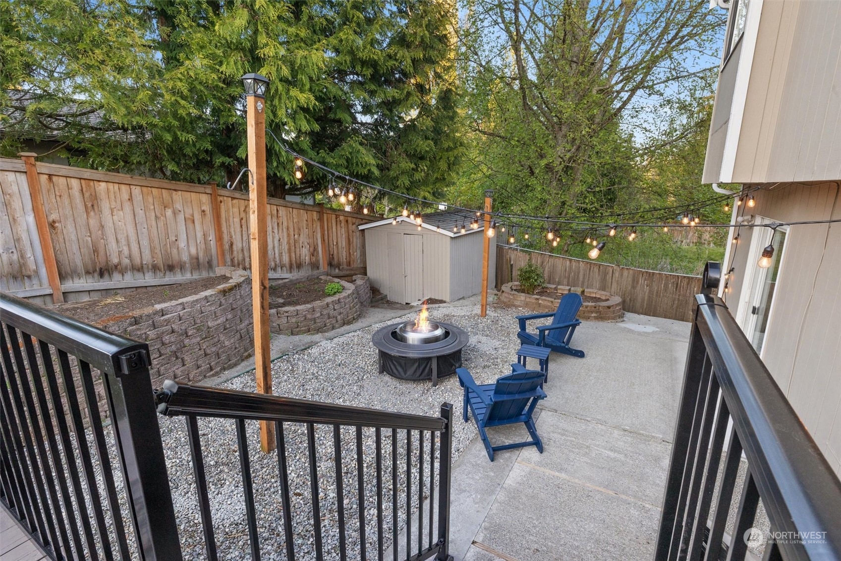 513 211th Place Southeast Bothell, WA 98021 - Photo 20 of 39 a view of deck with furniture and trees