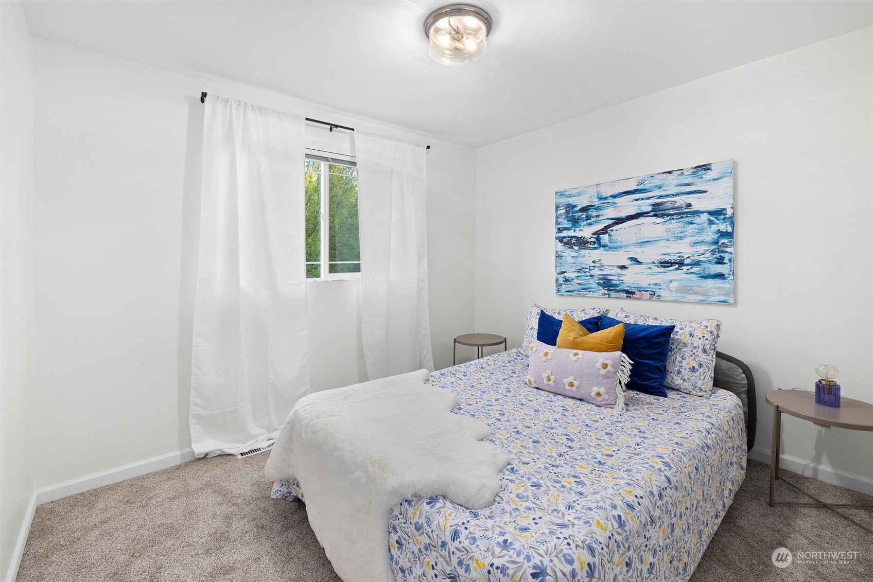 513 211th Place Southeast Bothell, WA 98021 - Photo 23 of 39 a bedroom with a bed and a window