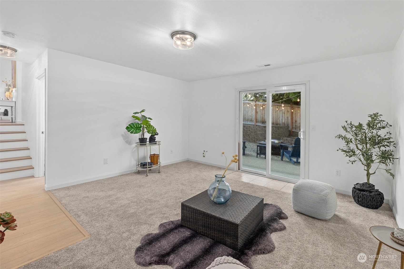 513 211th Place Southeast Bothell, WA 98021 - Photo 30 of 39 a living room with furniture and a potted plant