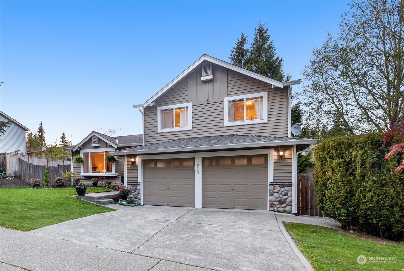 513 211th Place Southeast Bothell, WA 98021 - Photo 4 of 39 a front view of house with yard and green space
