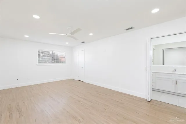 a view of an empty walk in closet