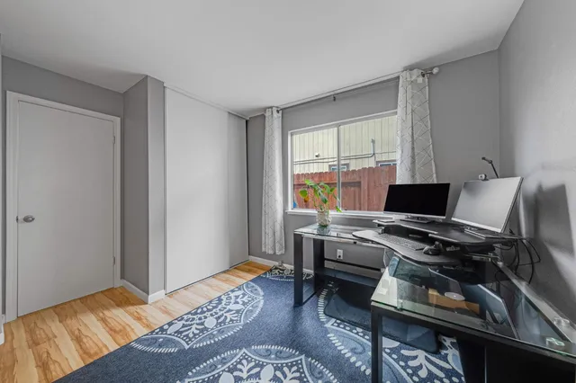 a workspace with furniture and lamp