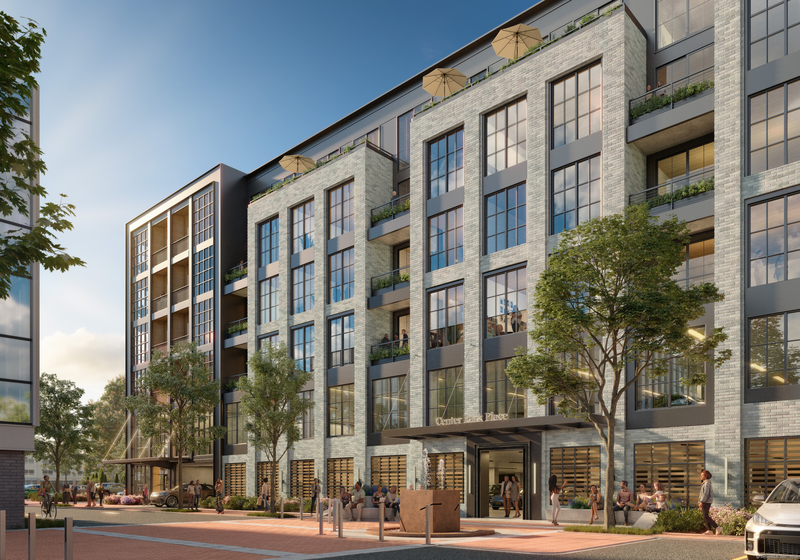 2 Arapahoe Road, Unit 415 West Hartford, CT 06107 - Photo 2 of 7 a view of a building and a street