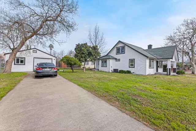 an aerial view of a house with a garden