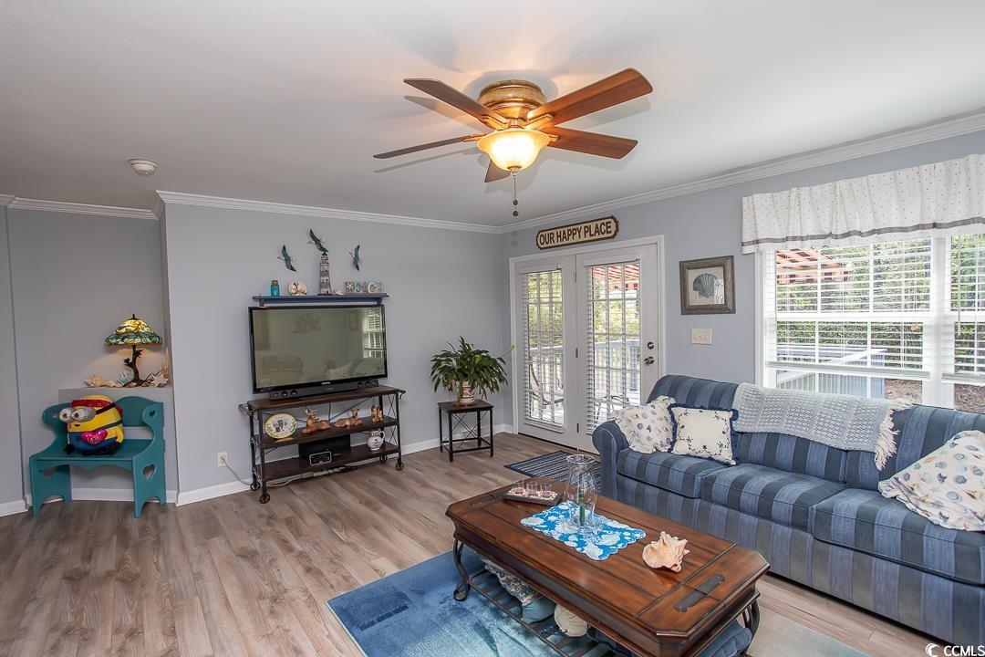 318 Walden Lake Road Conway, SC 29526 - Photo 11 of 33 Living room featuring french doors, light hardwood