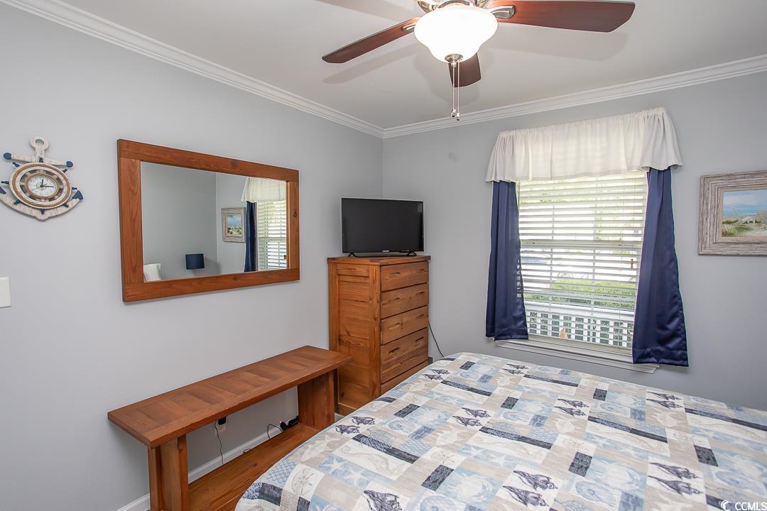 318 Walden Lake Road Conway, SC 29526 - Photo 21 of 33 Bedroom featuring ceiling fan, wood-type flooring,
