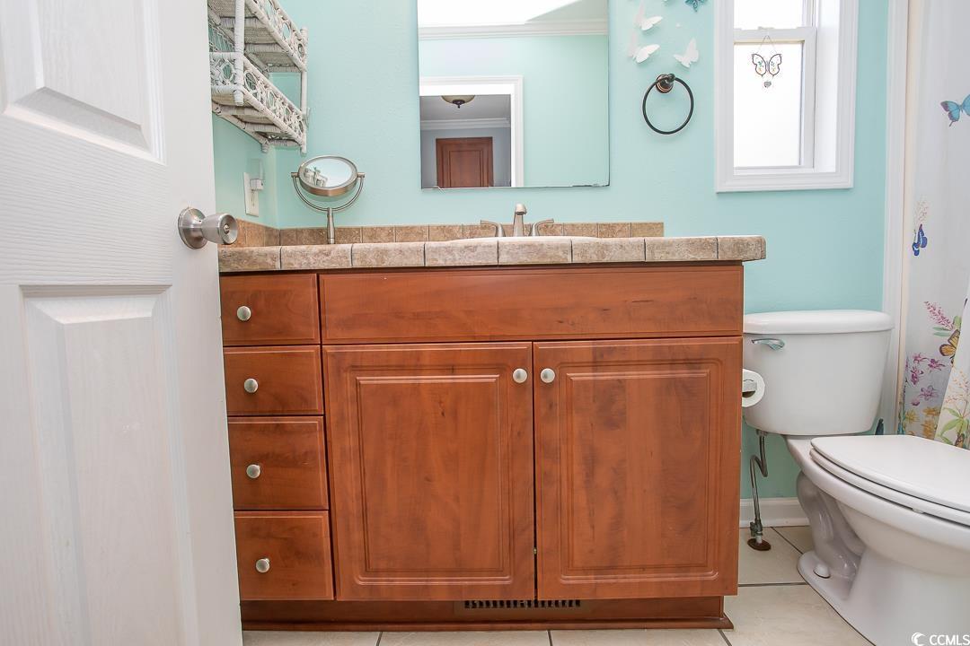 318 Walden Lake Road Conway, SC 29526 - Photo 24 of 33 Bathroom featuring tile patterned flooring, crown