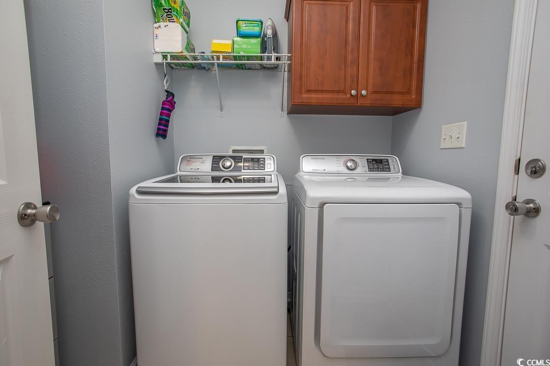 318 Walden Lake Road Conway, SC 29526 - Photo 8 of 33 Washroom featuring cabinets and washing machine an