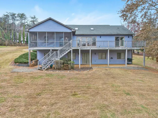 a house view with a lake view