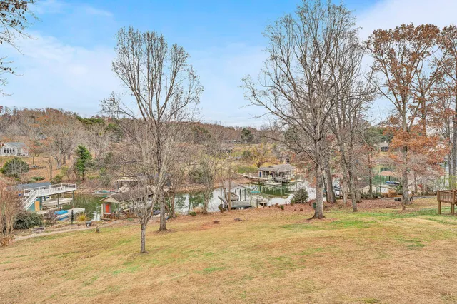 a view of a ocean with a table and chairs