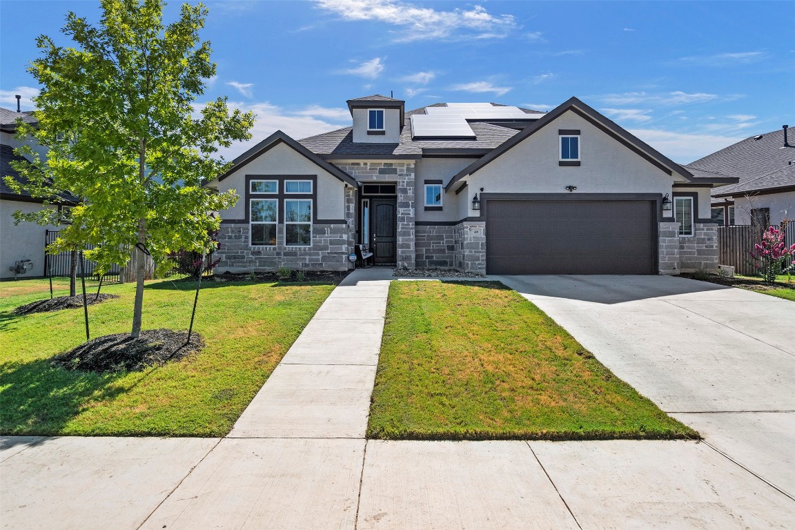 a view of a house with a swimming pool