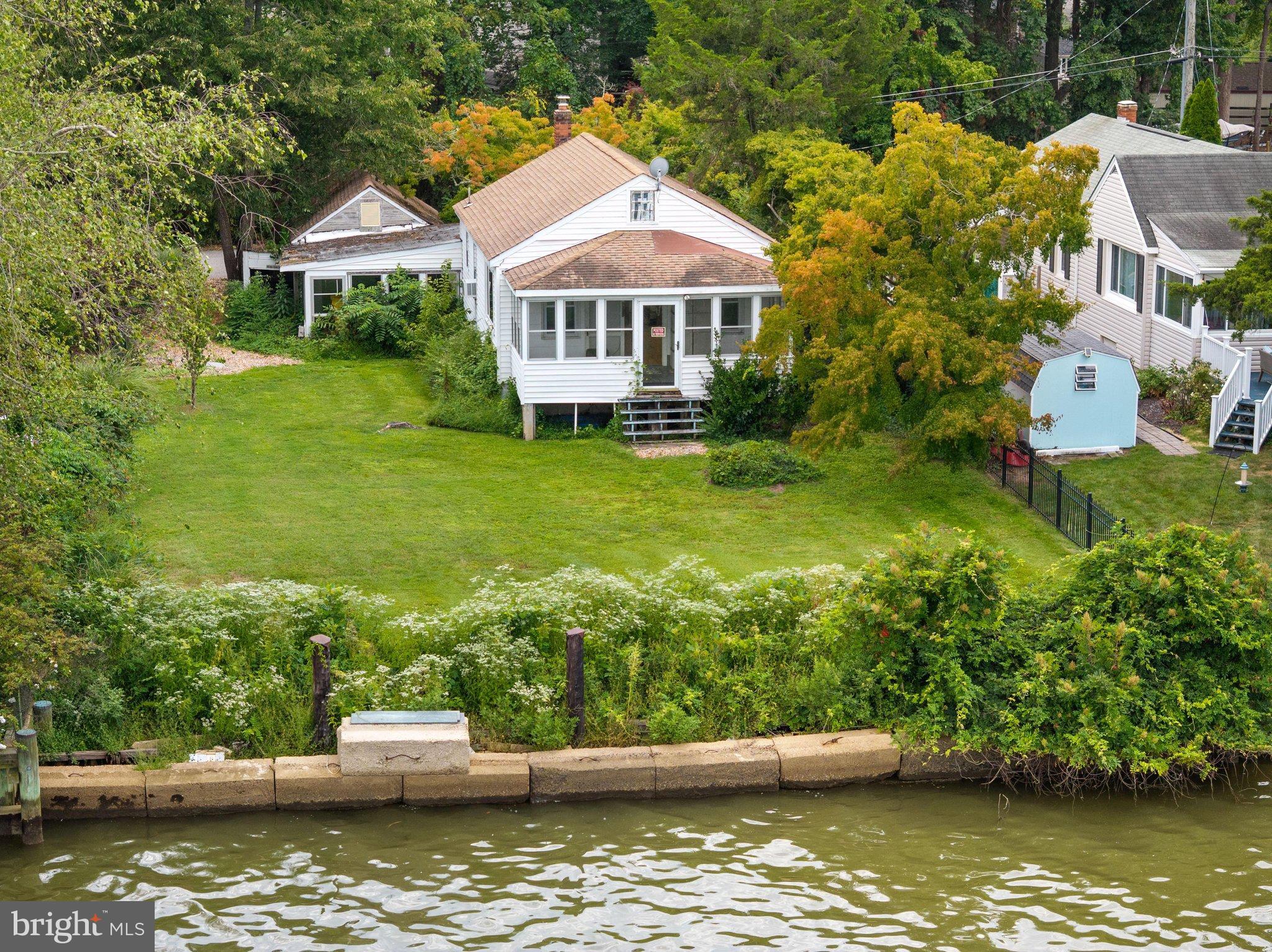 3635 Branhum Road Edgewater, MD 21037 - Photo 40 of 41 Lush, flat, green lawn along the waterfront