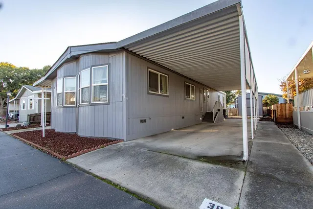 a view of a house with a street