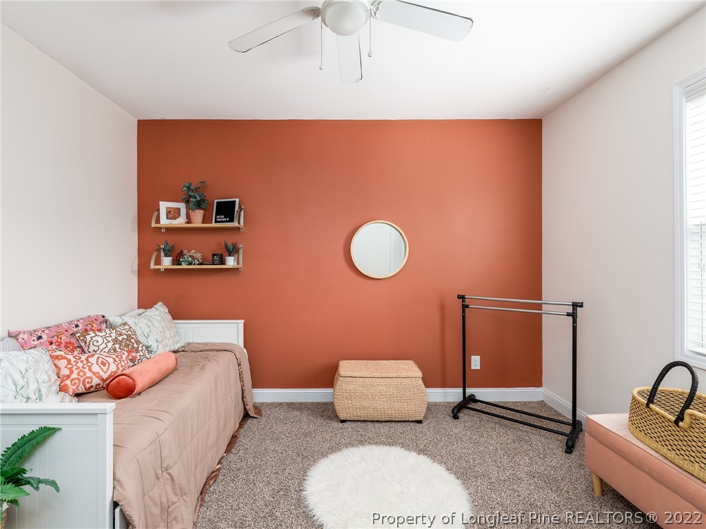 5137 Boxcut Lane Hope Mills, NC 28348 - Photo 20 of 48 a bedroom with a bed and a couch