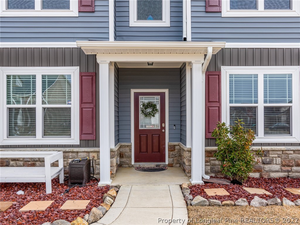 5137 Boxcut Lane Hope Mills, NC 28348 - Photo 2 of 48 a view of a entryway door front of house