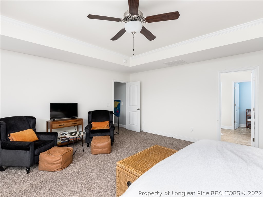 5137 Boxcut Lane Hope Mills, NC 28348 - Photo 25 of 48 a bedroom with furniture and a flat screen tv