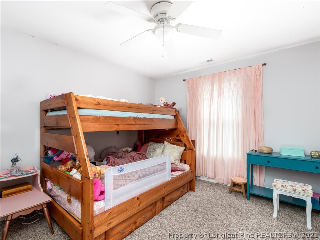 5137 Boxcut Lane Hope Mills, NC 28348 - Photo 41 of 48 a bed room with a bed and a window
