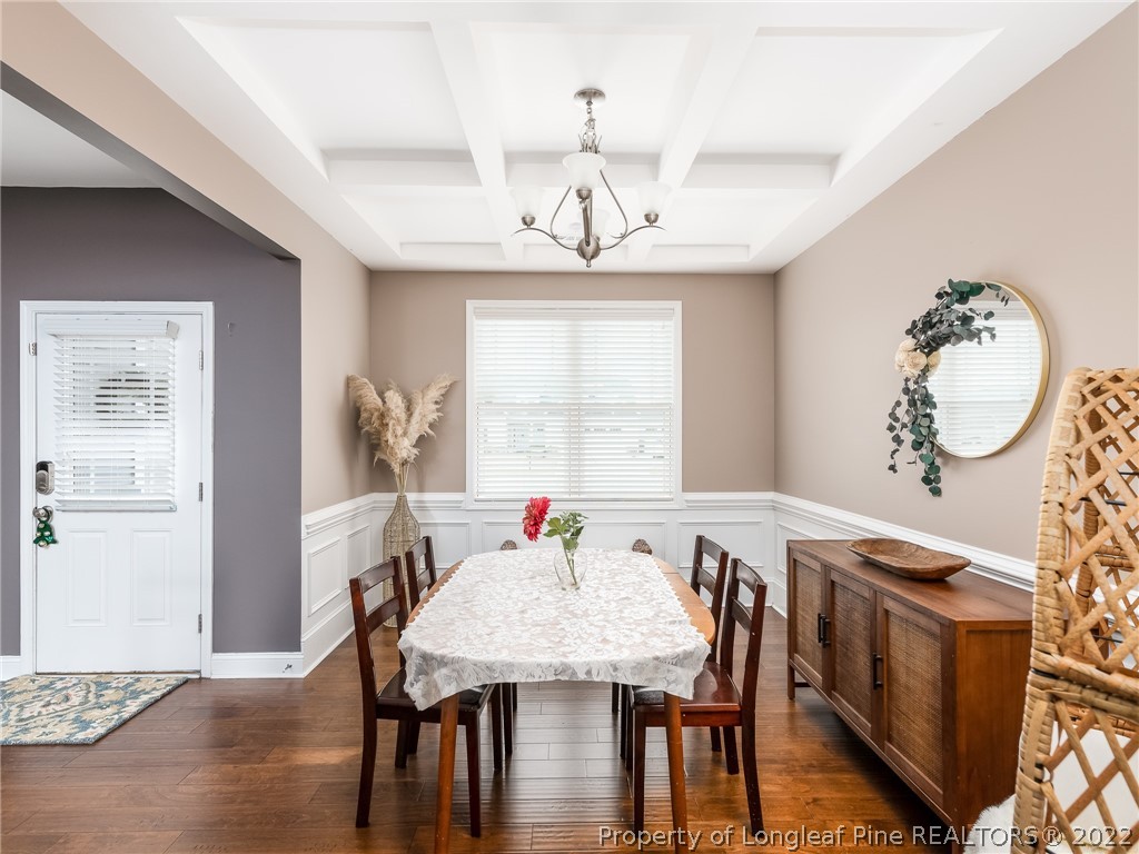 5137 Boxcut Lane Hope Mills, NC 28348 - Photo 8 of 48 a view of a dining room with furniture window and wooden floor