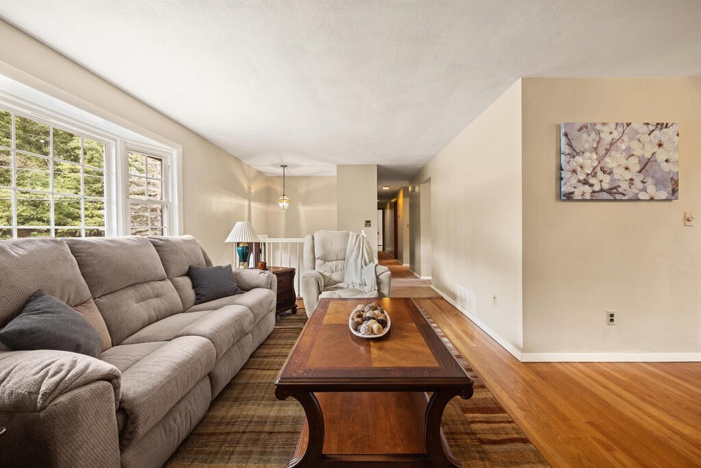 59 Old Stage Road Chelmsford, MA 01824 - Photo 6 of 37 a living room with furniture and a window