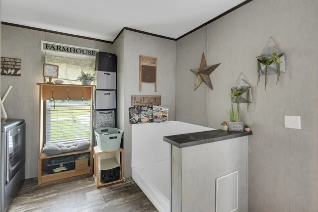 a kitchen with a sink stove and refrigerator