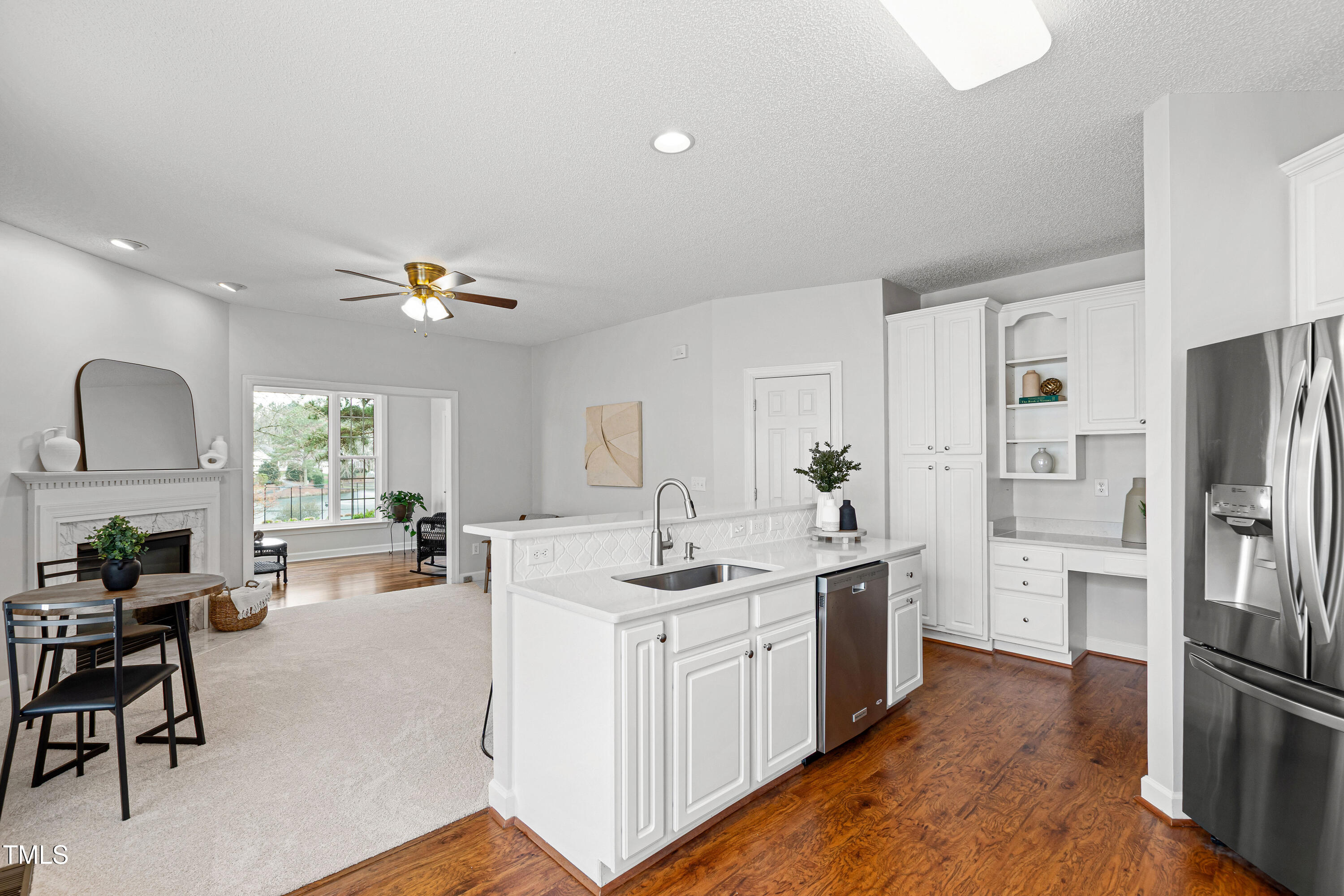 2024 Heritage Pines Drive Cary, NC 27519 - Photo 12 of 31 a kitchen with a refrigerator and a sink