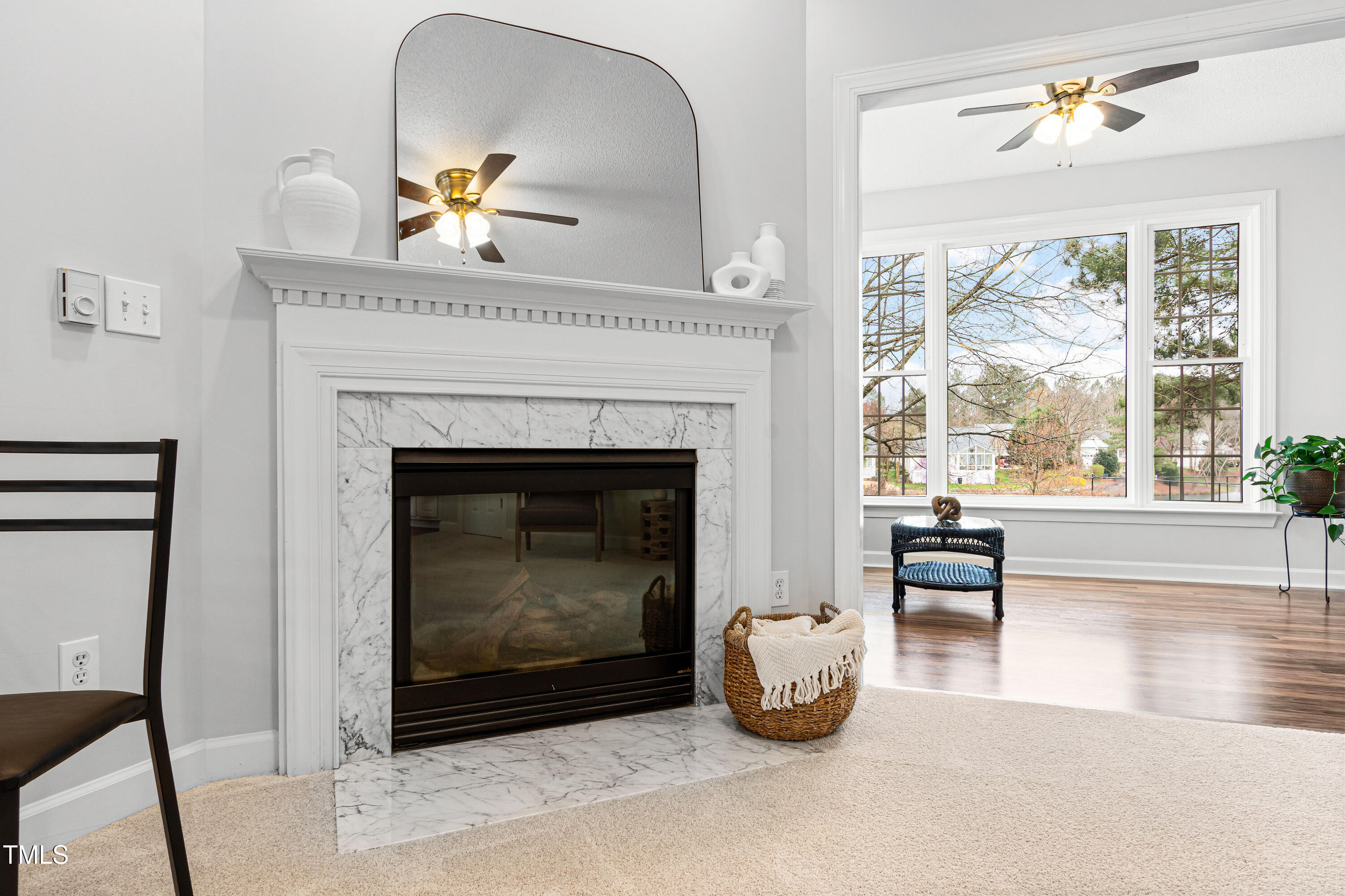 2024 Heritage Pines Drive Cary, NC 27519 - Photo 16 of 31 a living room with furniture and a fireplace
