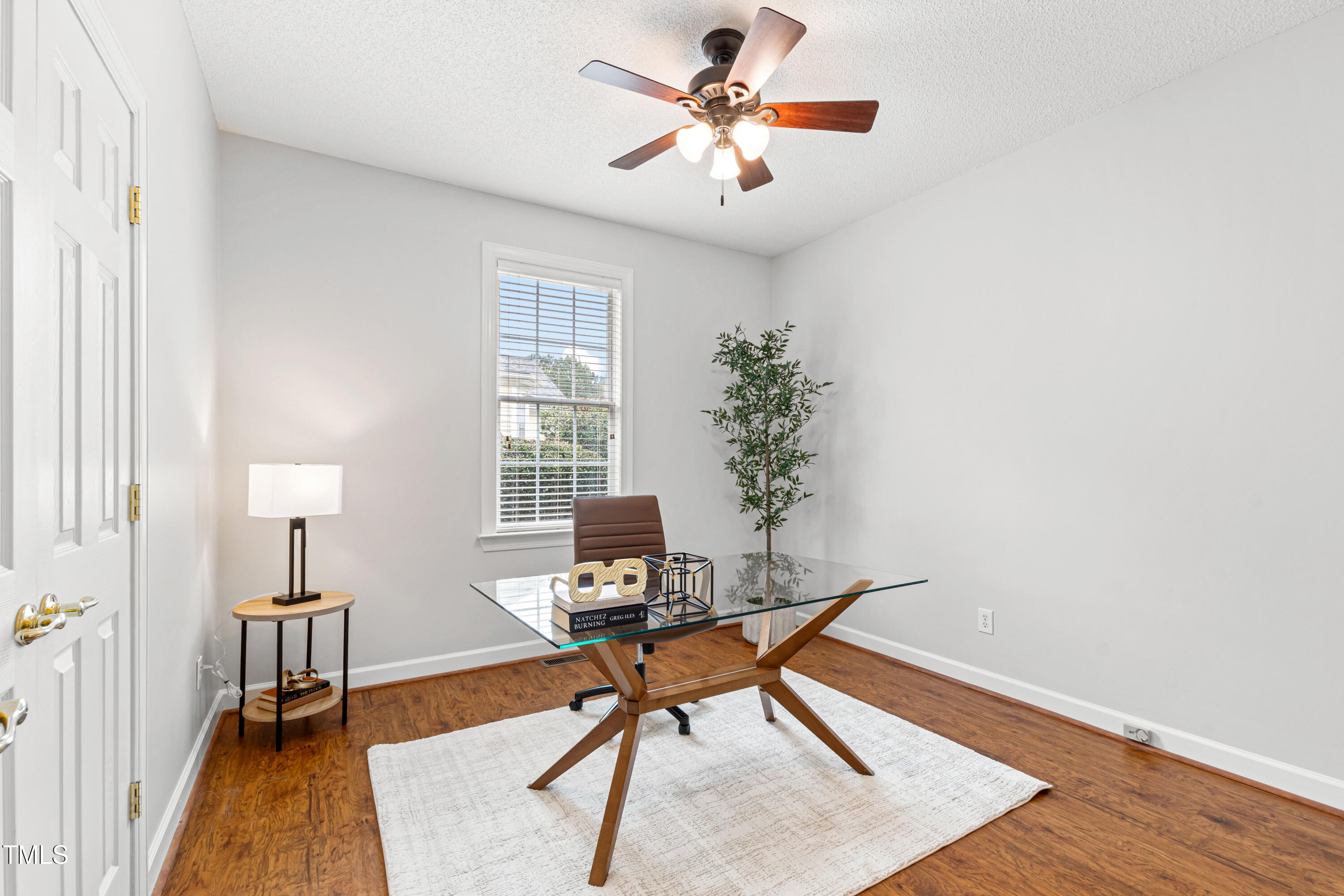 2024 Heritage Pines Drive Cary, NC 27519 - Photo 24 of 31 a workspace with furniture and a window