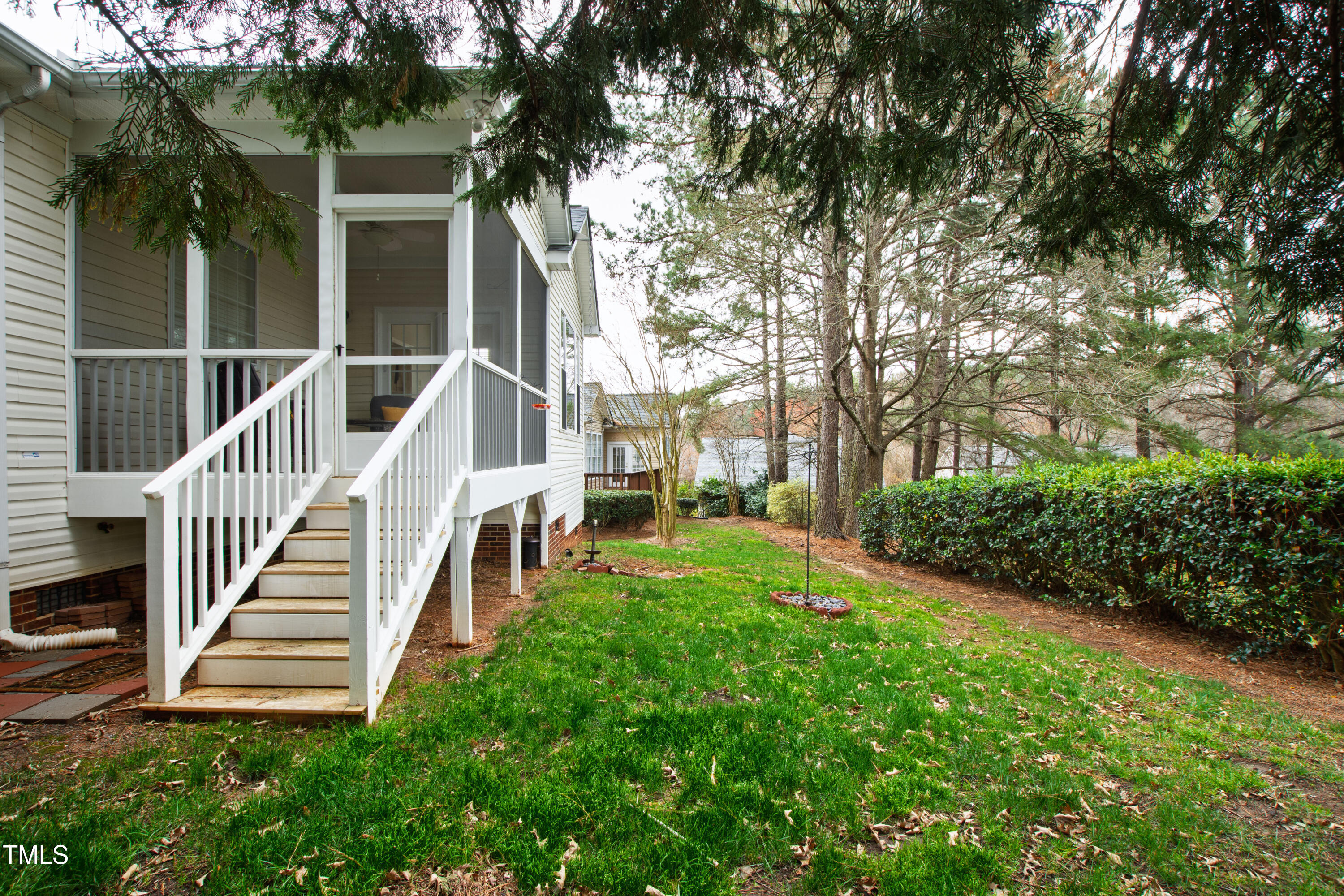 2024 Heritage Pines Drive Cary, NC 27519 - Photo 29 of 31 a view of a house with a yard