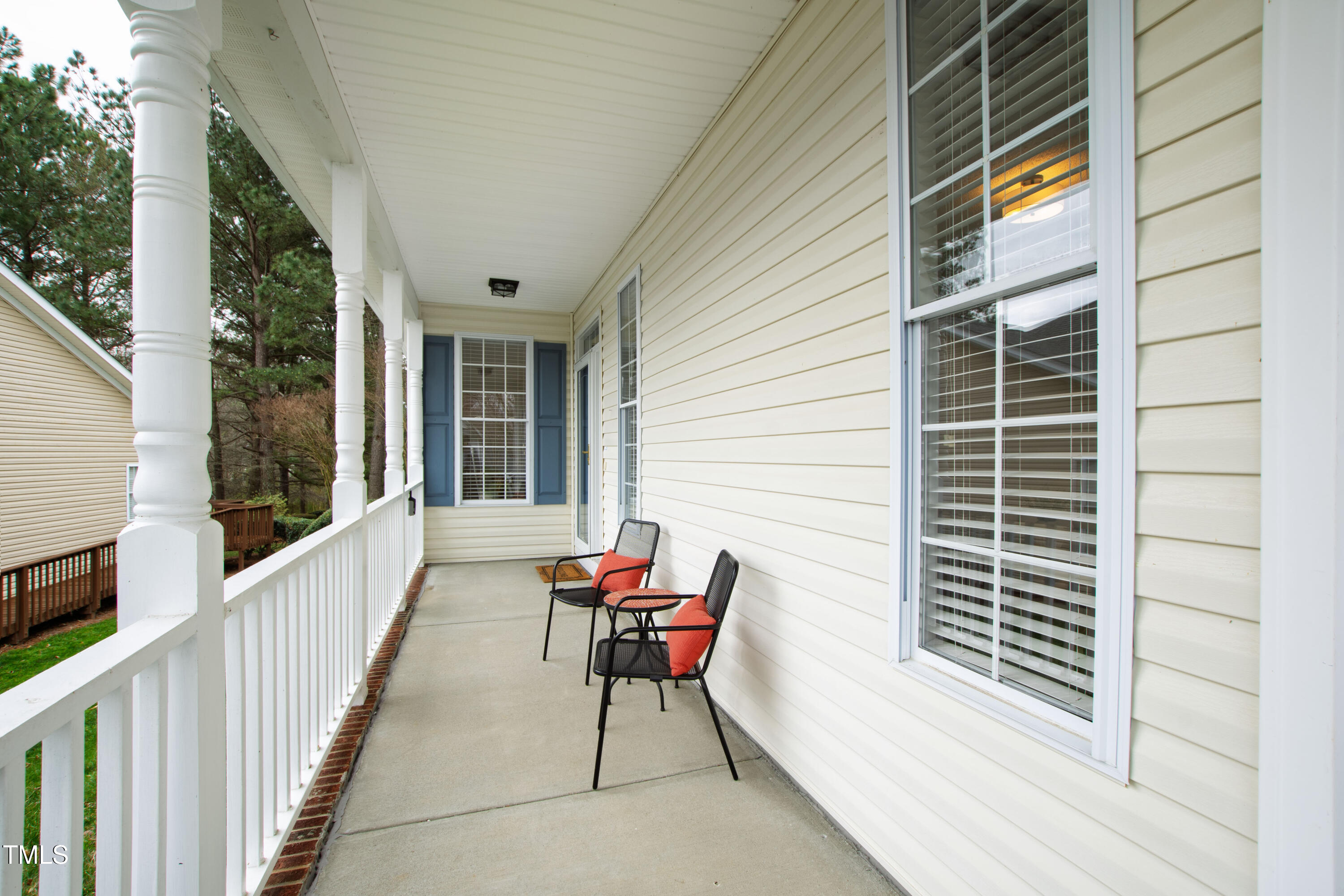 2024 Heritage Pines Drive Cary, NC 27519 - Photo 3 of 31 a balcony with furniture and next to a window