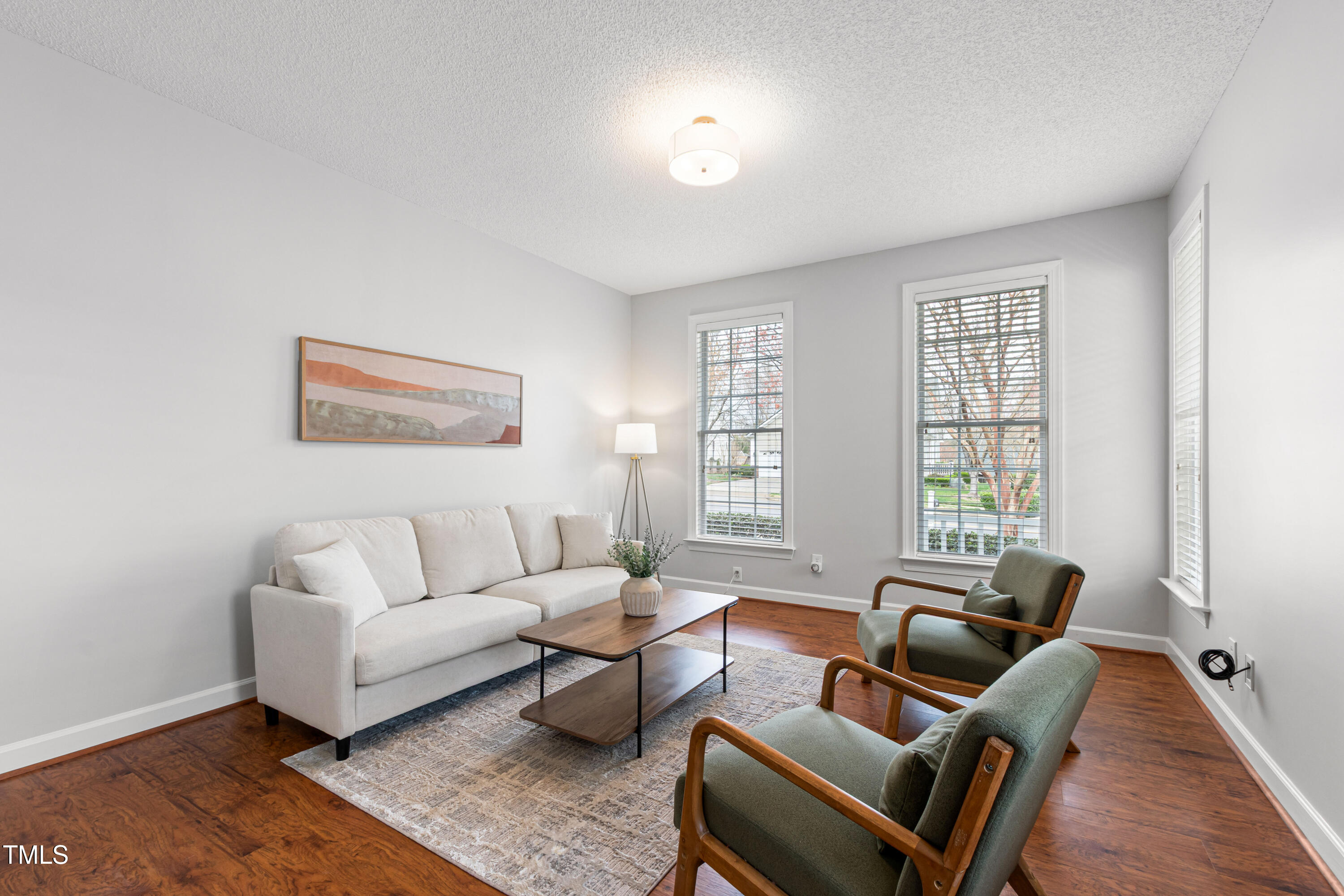 2024 Heritage Pines Drive Cary, NC 27519 - Photo 5 of 31 a living room with furniture and windows