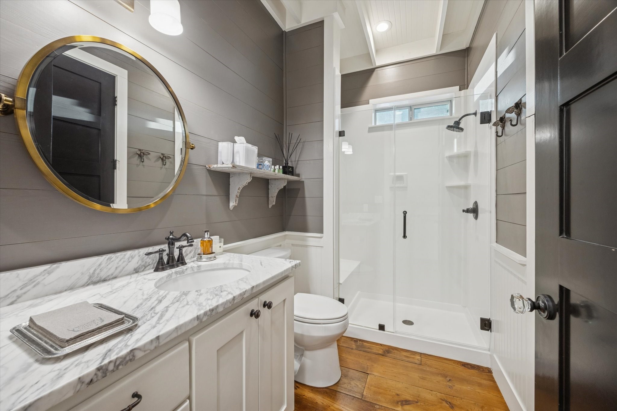 8611 Halamicek Loop Fayetteville, TX 78940 - Photo 13 of 41 a bathroom with a granite countertop toilet a sink and a mirror