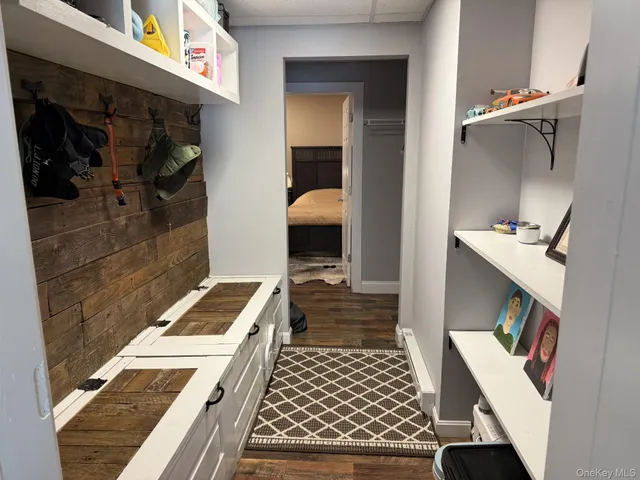 a bedroom with a bed and a rug