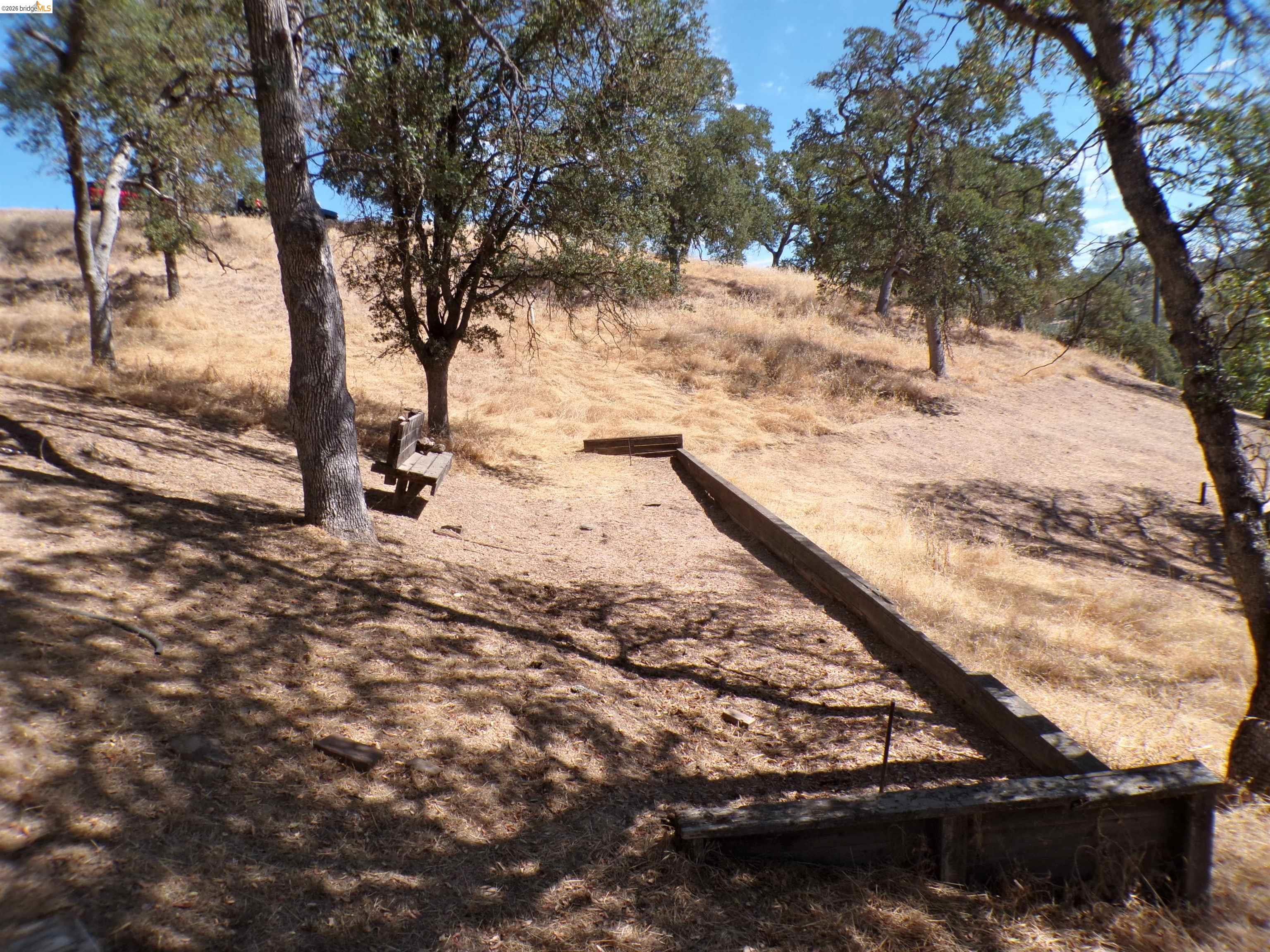 4271 Council Trail Copperopolis, CA 95228 - Photo 28 of 32 Gradual slope featuring mature trees and dry brush