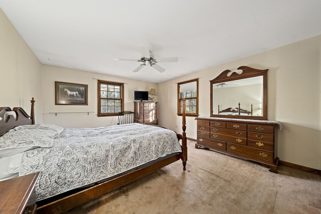 15 Forest Street Plympton, MA 02367 - Photo 14 of 37 a bedroom with a bed and a dresser