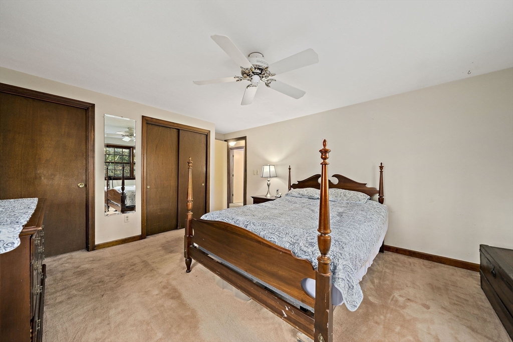 15 Forest Street Plympton, MA 02367 - Photo 16 of 37 a bed room with a bed and ceiling fan