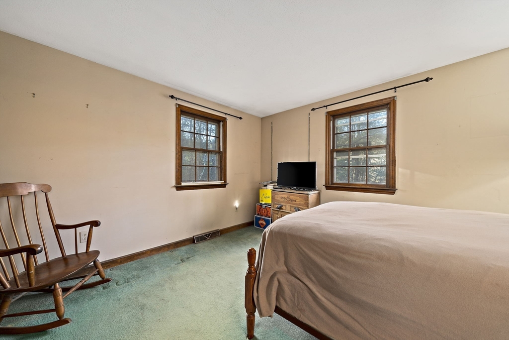 15 Forest Street Plympton, MA 02367 - Photo 18 of 37 a bedroom with a bed and a window