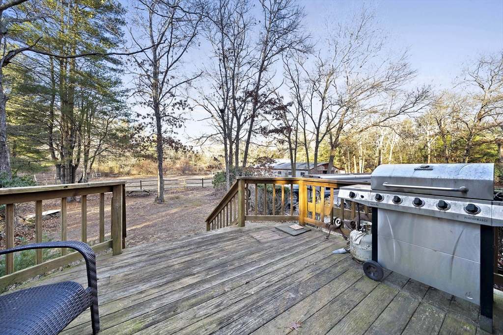 15 Forest Street Plympton, MA 02367 - Photo 20 of 37 a view of a roof deck with wooden floor and fence