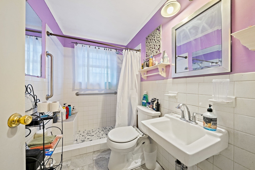 15 Forest Street Plympton, MA 02367 - Photo 20 of 37 a bathroom with a sink mirror vanity and toilet