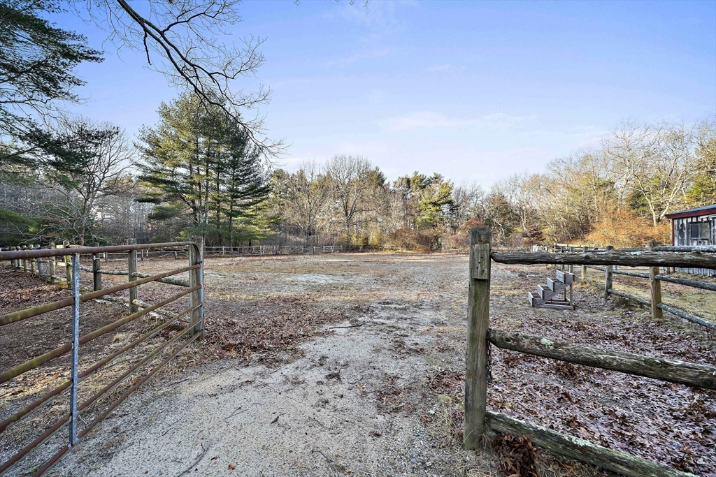 15 Forest Street Plympton, MA 02367 - Photo 22 of 37 a view of a fence in a yard