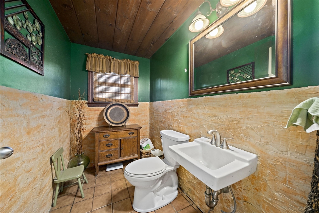 15 Forest Street Plympton, MA 02367 - Photo 10 of 37 a bathroom with a toilet sink and mirror