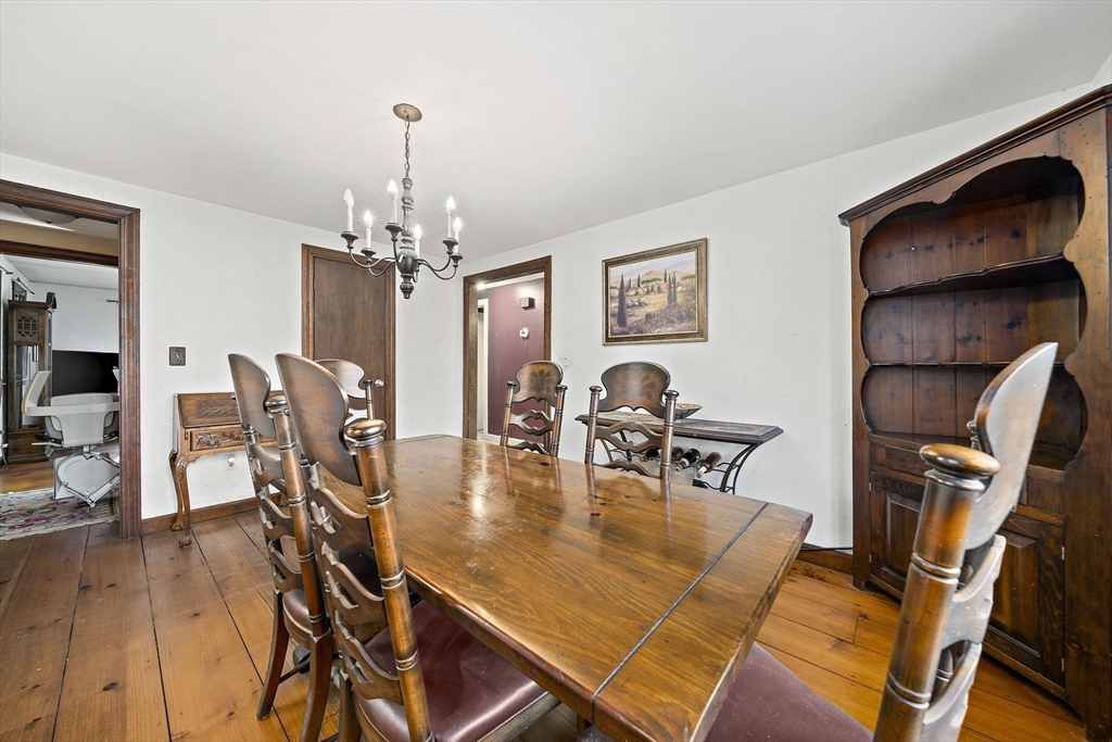 15 Forest Street Plympton, MA 02367 - Photo 10 of 37 a dining room with furniture a chandelier and wooden floor