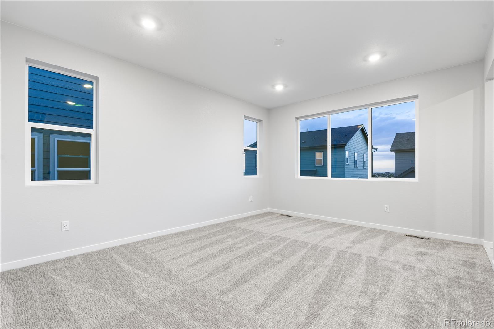 12051 Amplify Circle Lone Tree, CO 80134 - Photo 20 of 34 a view of an empty room with a window