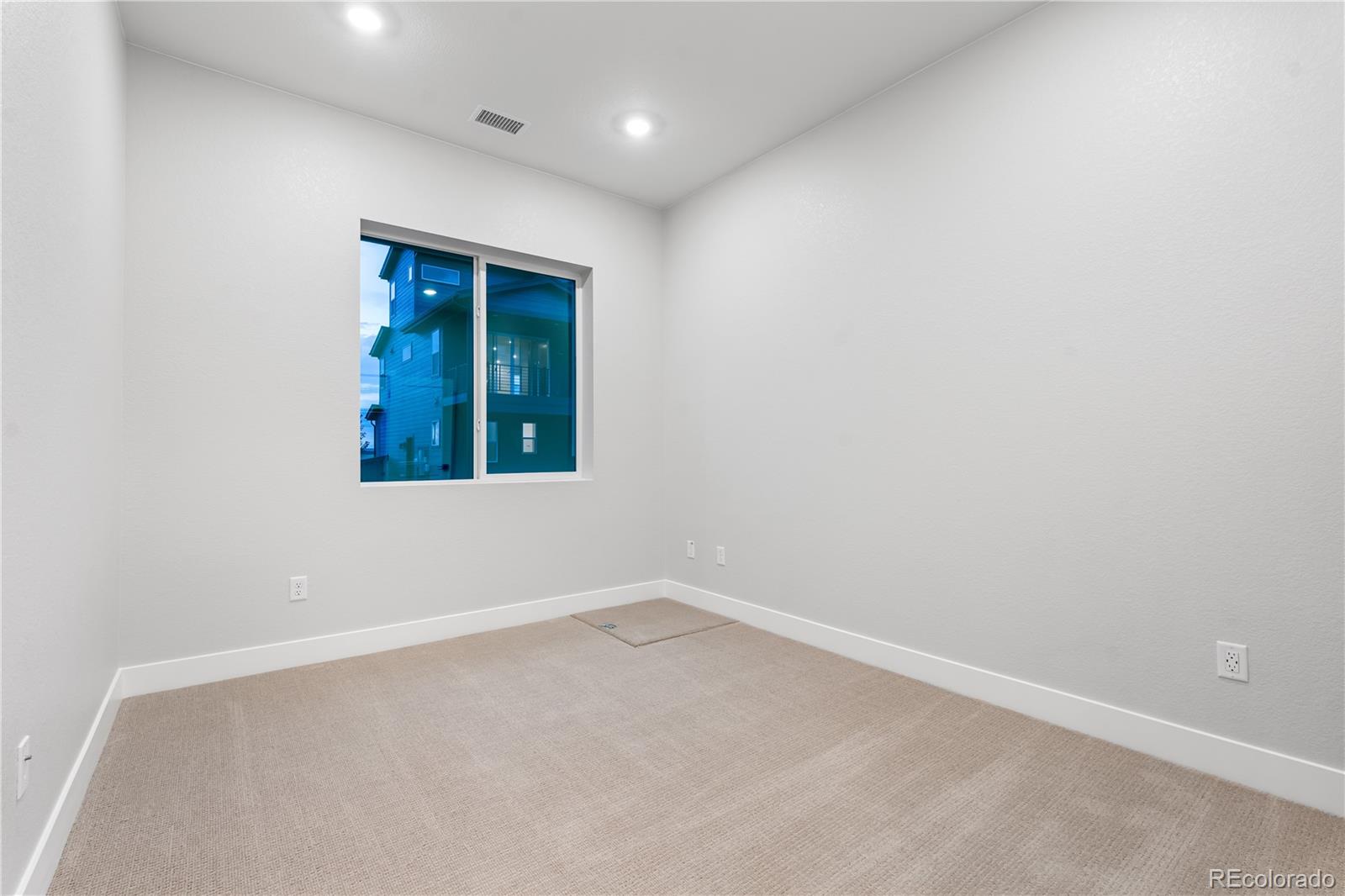 12051 Amplify Circle Lone Tree, CO 80134 - Photo 22 of 34 an empty room with a window