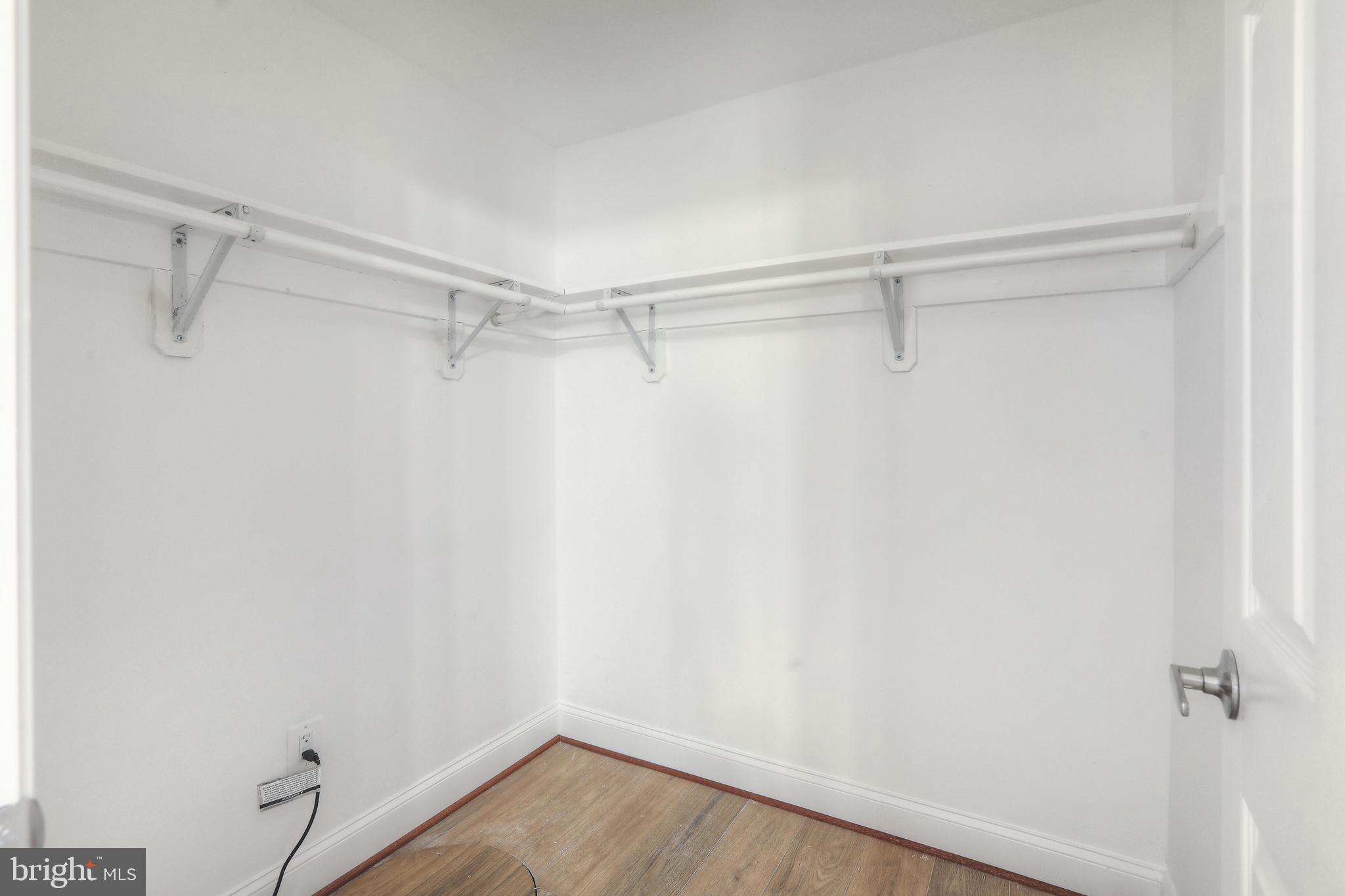 812 Park Avenue, Unit LL Baltimore, MD 21201 - Photo 12 of 16 a view of a room with racks on the wall